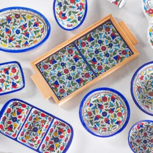 Handcrafted Ceramic Bowls and Plates with Colorful Floral Design